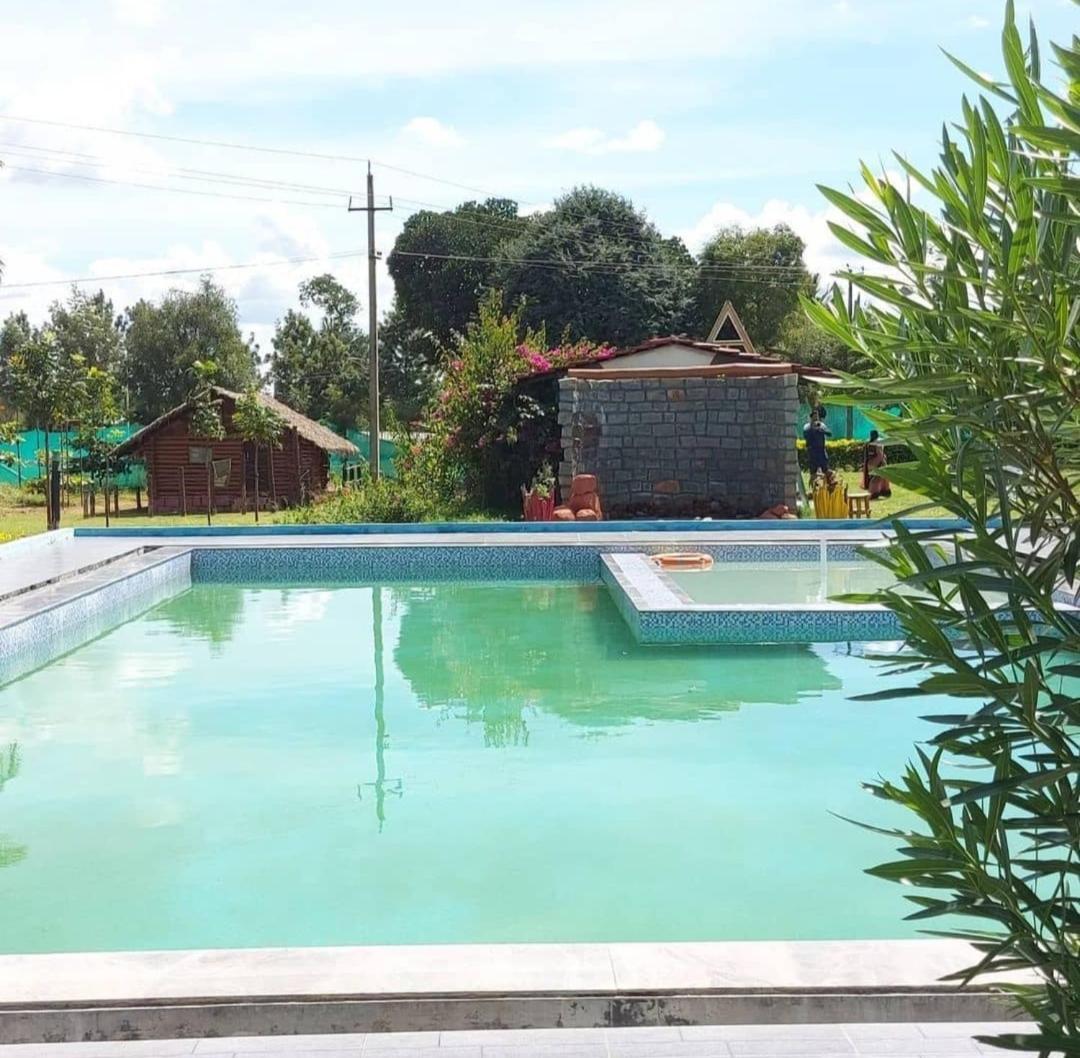 Dejavoo Hotel Gadigarpalya ภายนอก รูปภาพ